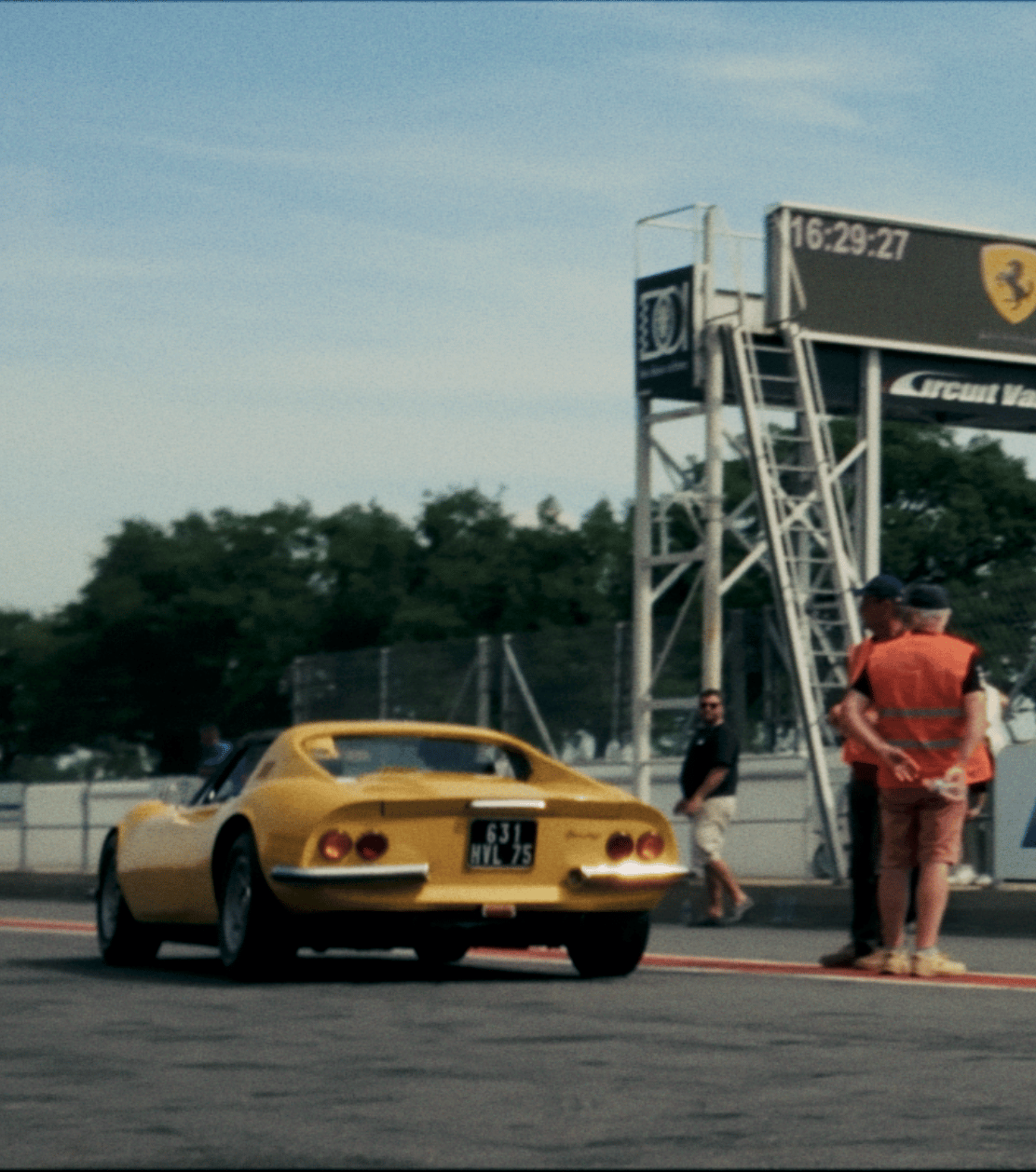 Graphic depicting a mountain peak at sunset cropped in a circle with the words RANGE CRAZY above and below.